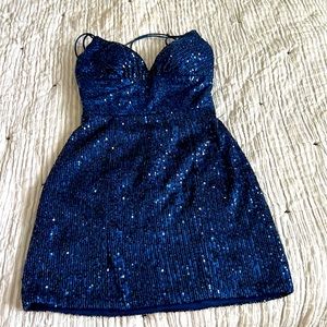 The beautiful mini dress was worn once.